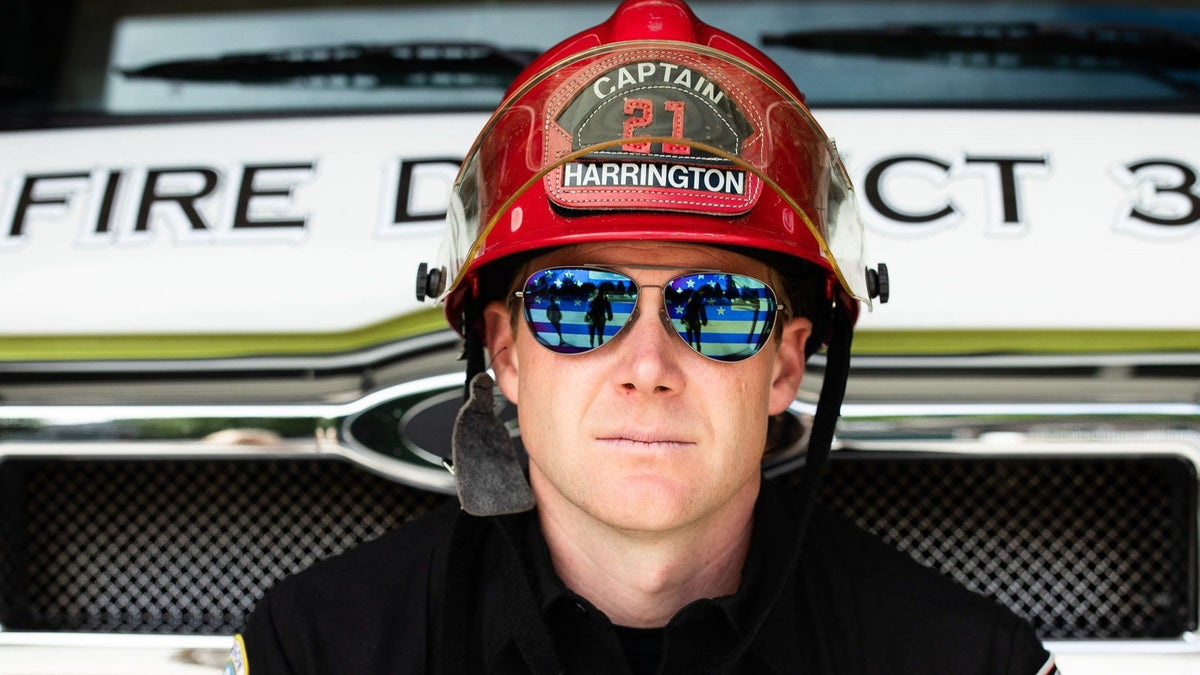 Image of a fireman wearing American Flag Aviator sunglasses.